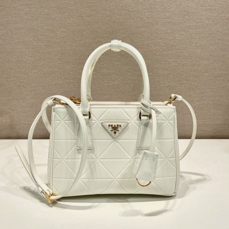 Pra*a top handle bags